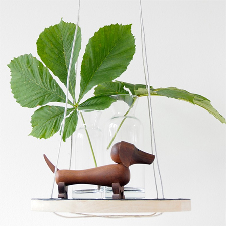 hanging bedside shelf with pine chopping board and steel lighting wire
