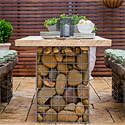 Gabion-style outdoor table and benches