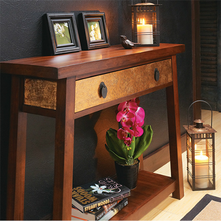 Use metallic foil to add a touch of glam to furniture