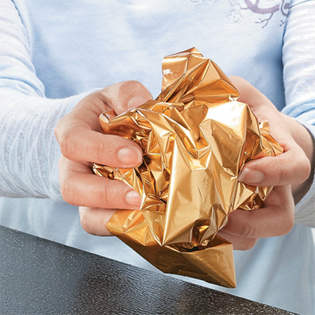 Use metallic foil to add a touch of glam to furniture