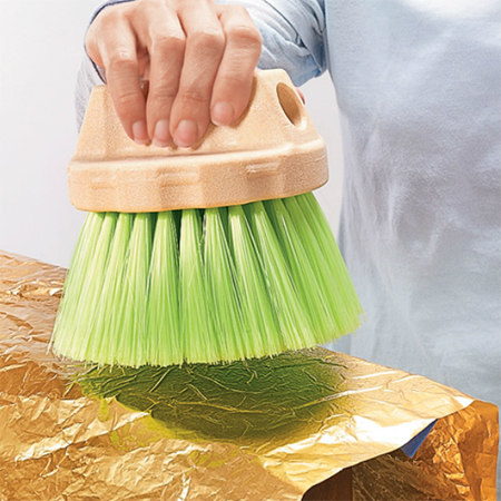 Use metallic foil to add a touch of glam to furniture