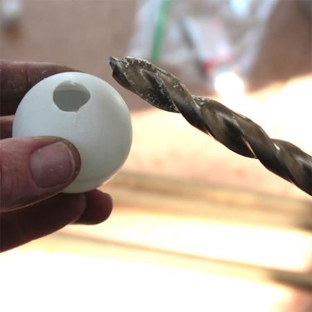 PVC pipes and ping-pong ball curtain rod and finials! 