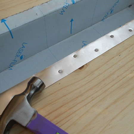 Slot the channel into the centre of the table