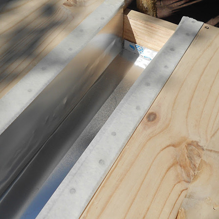 Place a strip of masking tape along the top edge