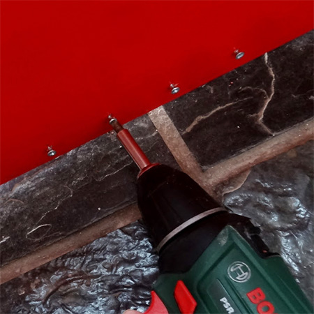 fit door sweep draught excluder to keep out rain and cold draughts