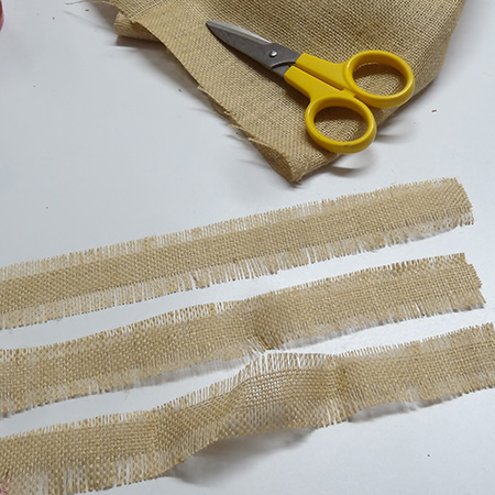 Recycled can plant holder