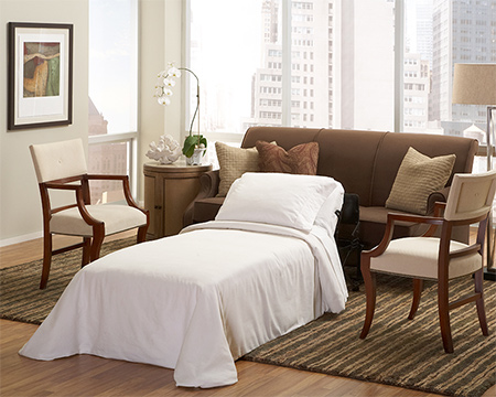 Ottoman folds out into single bed 