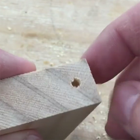 3. Drill out a pockethole and you will end up with an exit hole at the end, as shown below.