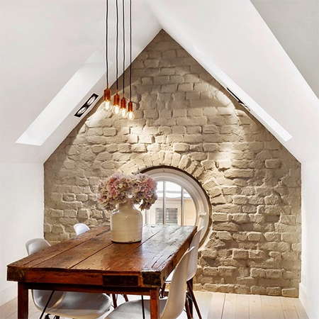 Attic conversion becomes spacious living space dining room
