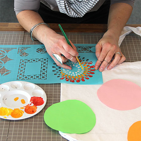 Make your own cotton tote bag or dress up a plain tote bag with a handmade stencil and some colourful acrylic craft paints