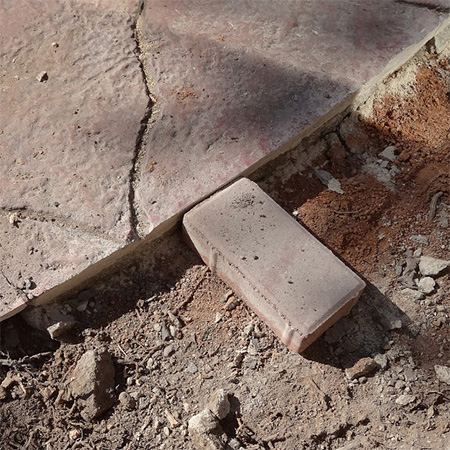 cutting concrete slab with angle grinder