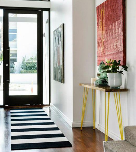 stripes with striped rug in entrance