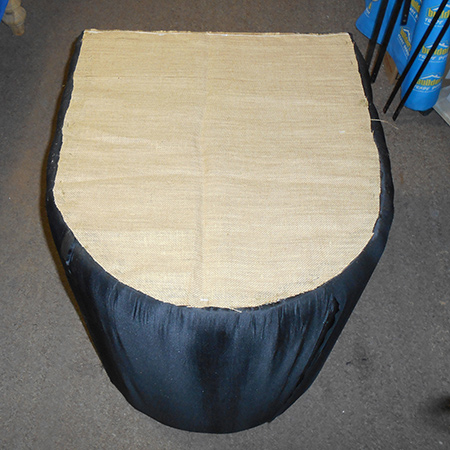 For a professional finish add a scrap of fabric to the base to cover up the staples. Cut to fit and glue this in place with contact adhesive.
