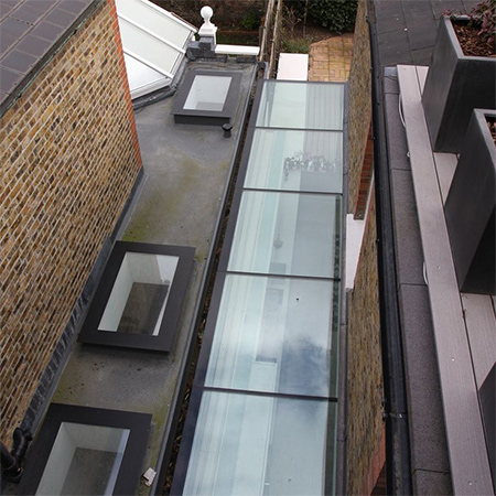 Glazing, walk-on rooflights and skylights