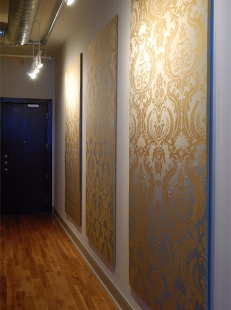 Decorate bare walls with framed wallpaper panels