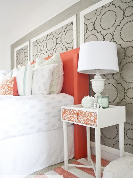 framed geometric wallpaper panels in bedroom