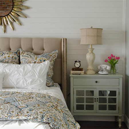 DIY plank wall in a bedroom painted white