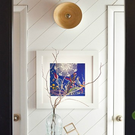 DIY plank wall in a bedroom vertical strips