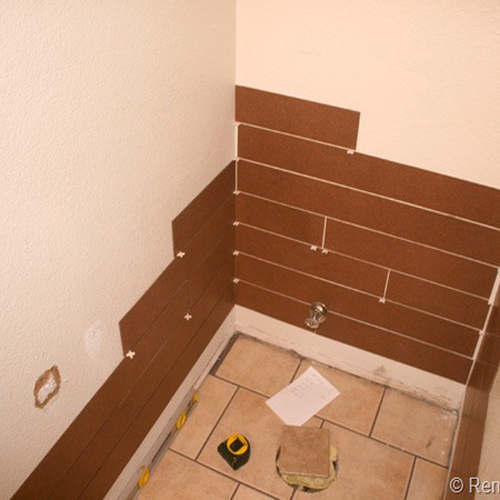 DIY plank wall in a bedroom using hardboard or masonite