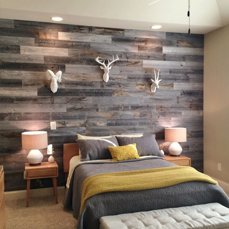 DIY reclaimed wood or timber plank wall in a bedroom