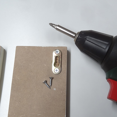 keyhole bracket for mounting onto wall