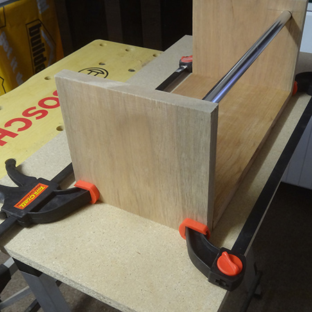 9. Repeat for the other side - inserting the chrome pipe before placing the side section in position and clamping the project to dry overnight.