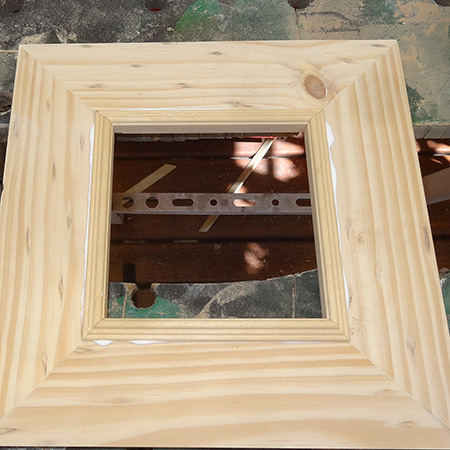 Apply wood glue to the moulding and fit to the inside of the frame.&nbsp;