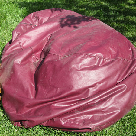 Re-purpose an old beanbag into a comfy pouff