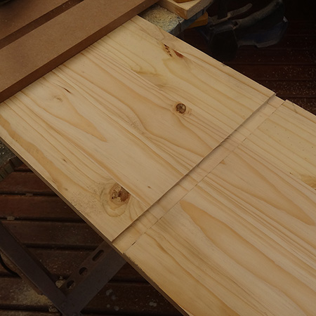 This process is repeated with the guide bushing against the back edge of the jig.&nbsp;