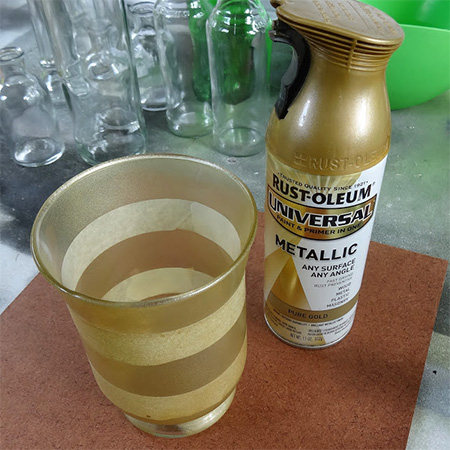 Rust-Oleum Universal Metallic spray paints can be used on glass or on dated decor accessories to give them an updated look