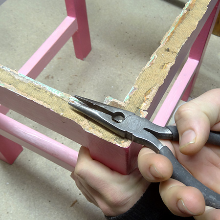 The old hardboard seats and backs were glued and secured with panel pins. These were ripped off and the panel pins pulled out. 