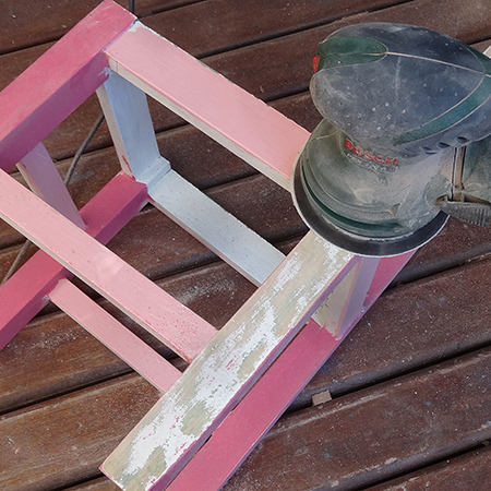 To cut down on the amount of time spent sanding it's always practical to start with a rough grit sanding pad. These pads (40, or 60-grit) have large gaps between the grit that collects paint and don't clog up too quickly. 