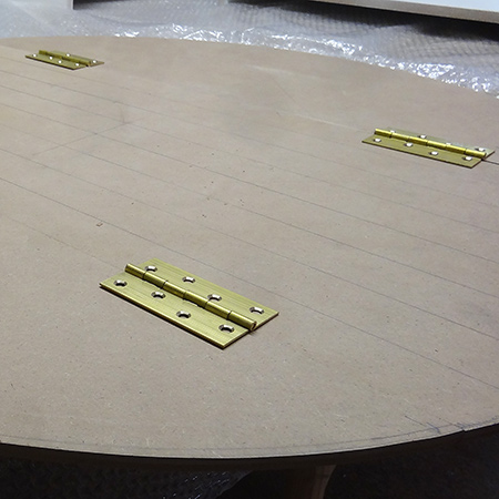 Make a round drop-leaf table