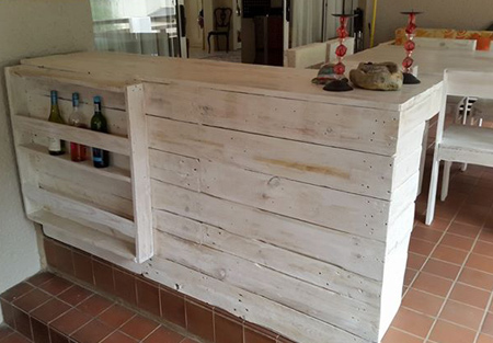 Dining tables and chairs made from reclaimed pallets