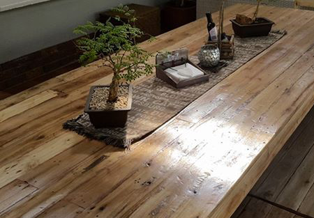 Dining tables and chairs made from reclaimed pallets