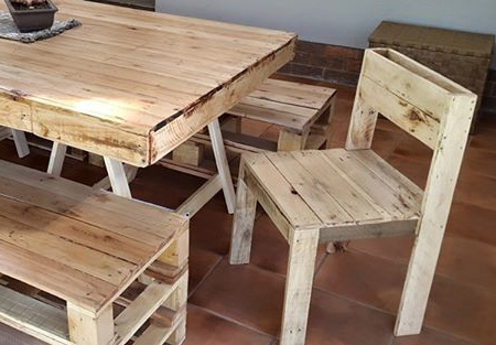 Dining tables and chairs made from reclaimed pallets