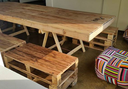 Dining tables and chairs made from reclaimed pallets