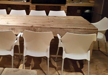 Dining tables and chairs made from reclaimed pallets