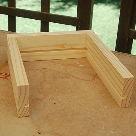 If you don't have a router you can cut the base to the exact size and use steel angle braces to hold the base in place.