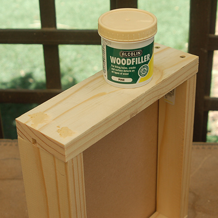 With the base fitted you can attach the remaining end. Make sure that the screws are recessed slightly to allow you to add wood filler and cover up. Once dry, sand the wood filler smooth.