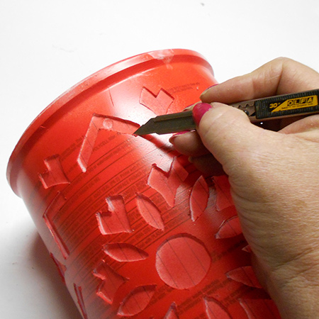 Upcycle a plastic paint container into a trendy pendant lamp