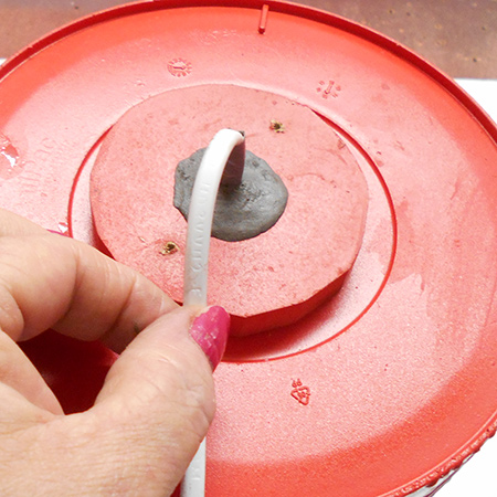 Upcycle a plastic paint container into a trendy pendant lamp