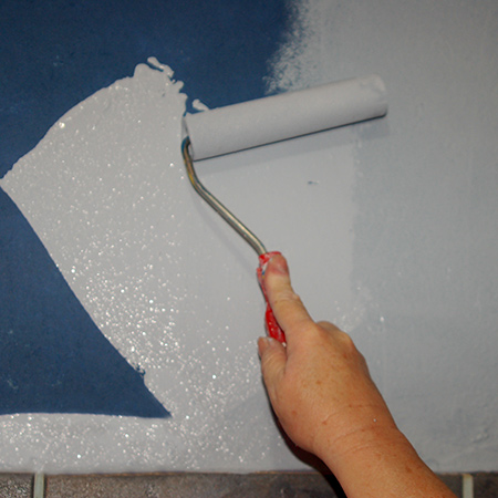 work the roller in a 'W' shape to spread the paint over the wall