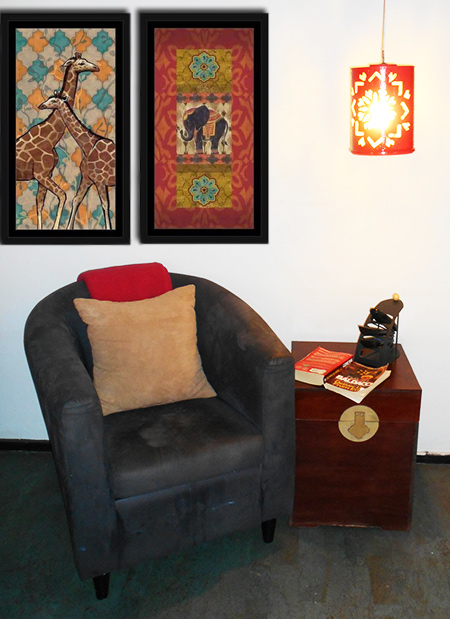 The upcycled plastic paint container was given a Moroccan theme to match the artwork