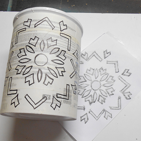 Upcycle a plastic paint container into a trendy pendant lamp