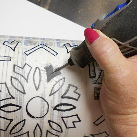 Upcycle a plastic paint container into a trendy pendant lamp