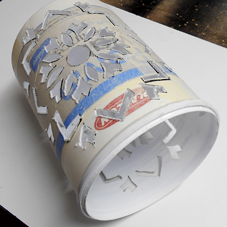 Upcycle a plastic paint container into a trendy pendant lamp