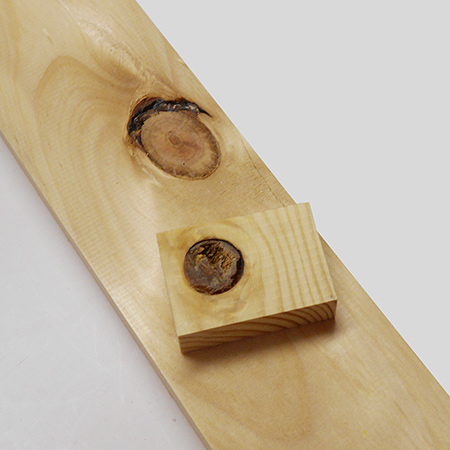 Knots in the wood will over time dry out and fall out of the board or plank