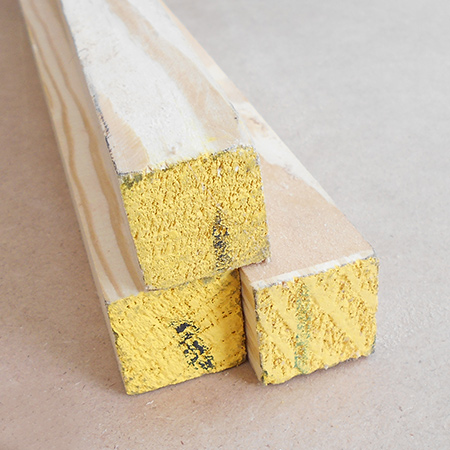 After acclimatizing pine at home for about a week, trim the raw edges of the board or plank to remove the yellow preservative applied to protect the wood during storage.