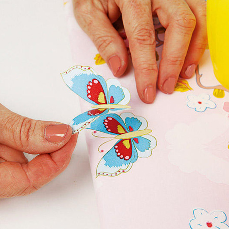 Easy and colourful coat hanger for child's bedroom
